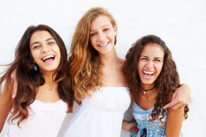 smiling girls with braces Siri C Steinle DMD Brockton, MA